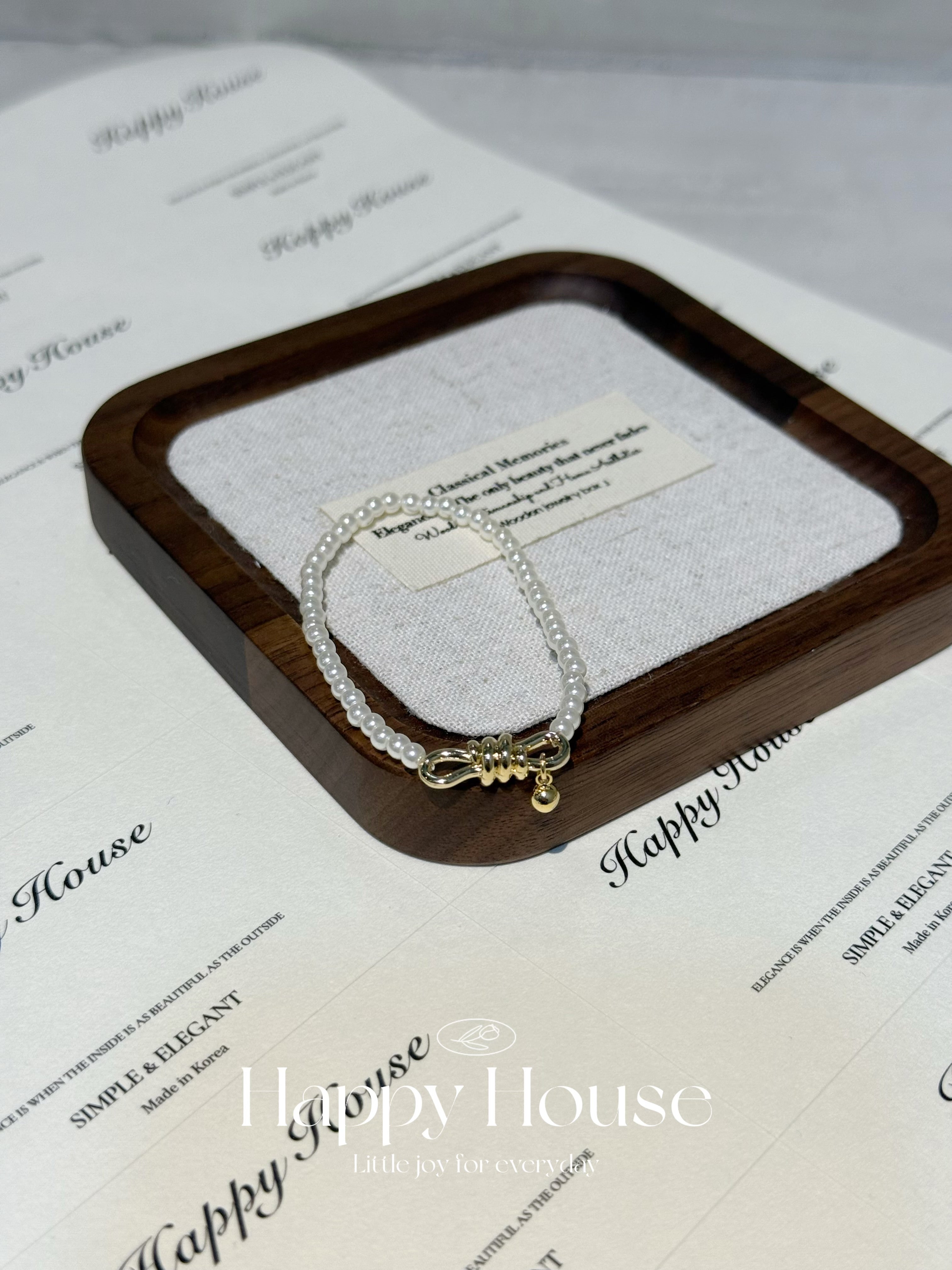 扭結珍珠橡筋手鏈￼