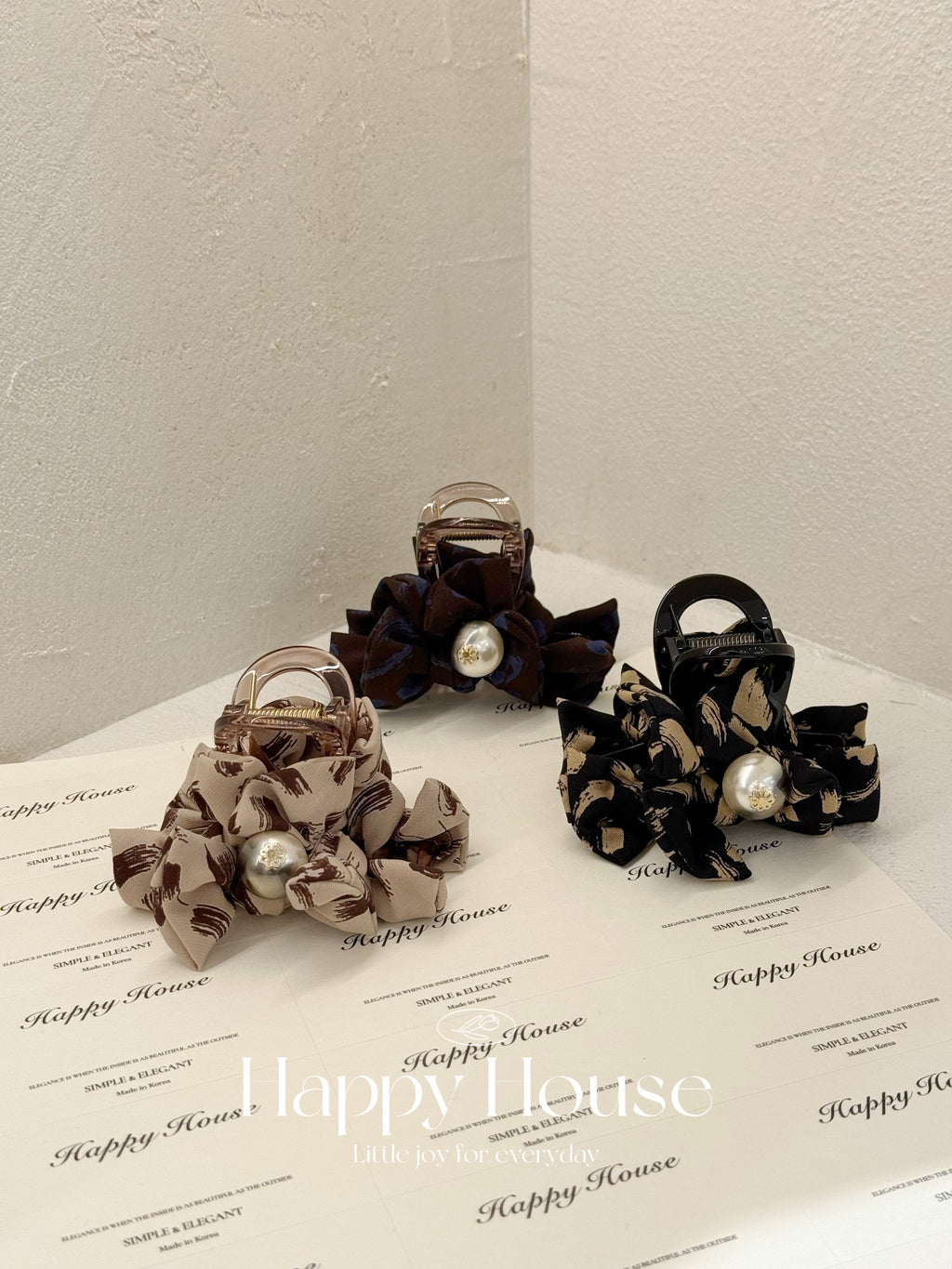 三色花紋布蝴蝶結珍珠抓夾