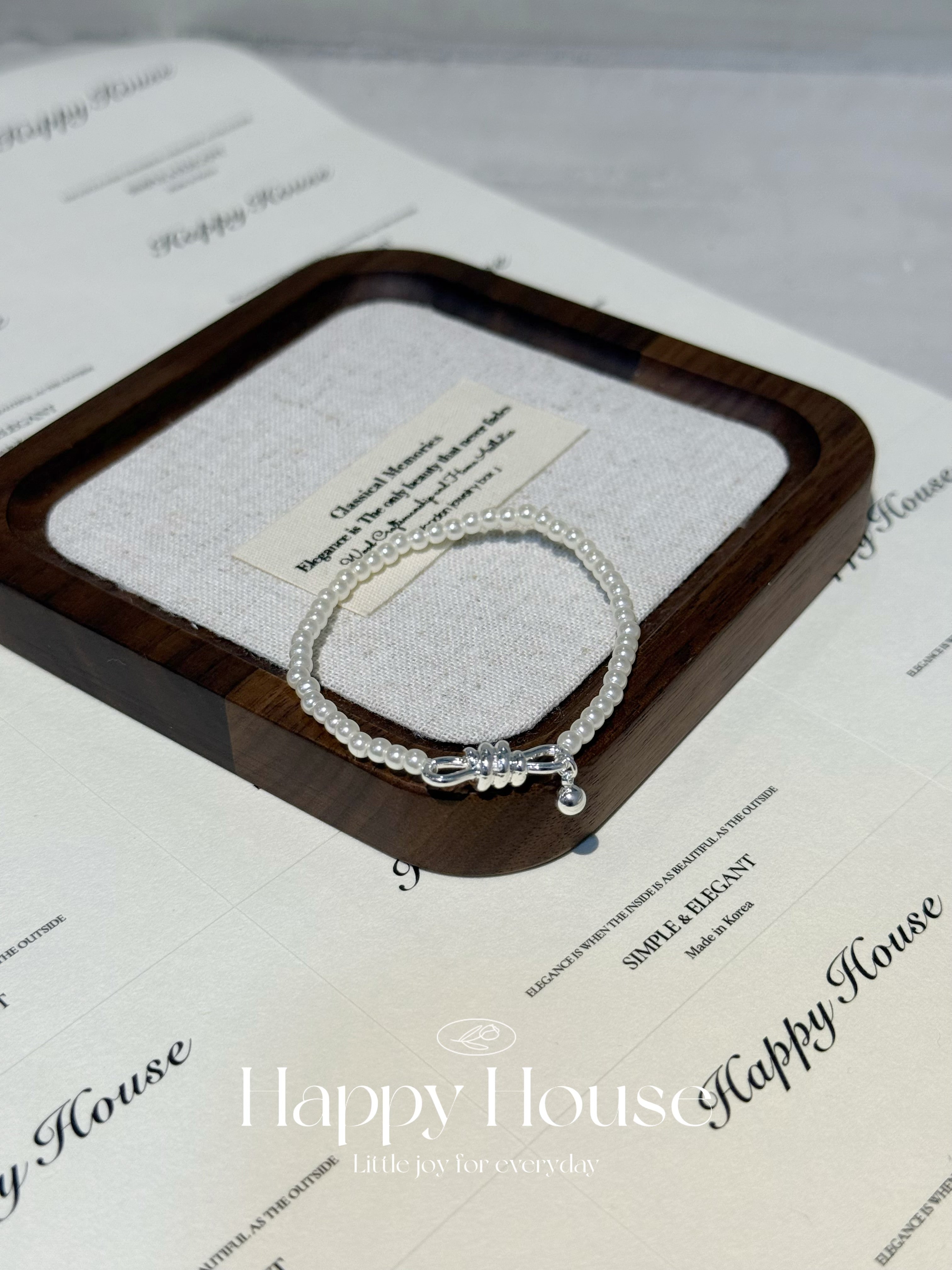 扭結珍珠橡筋手鏈￼