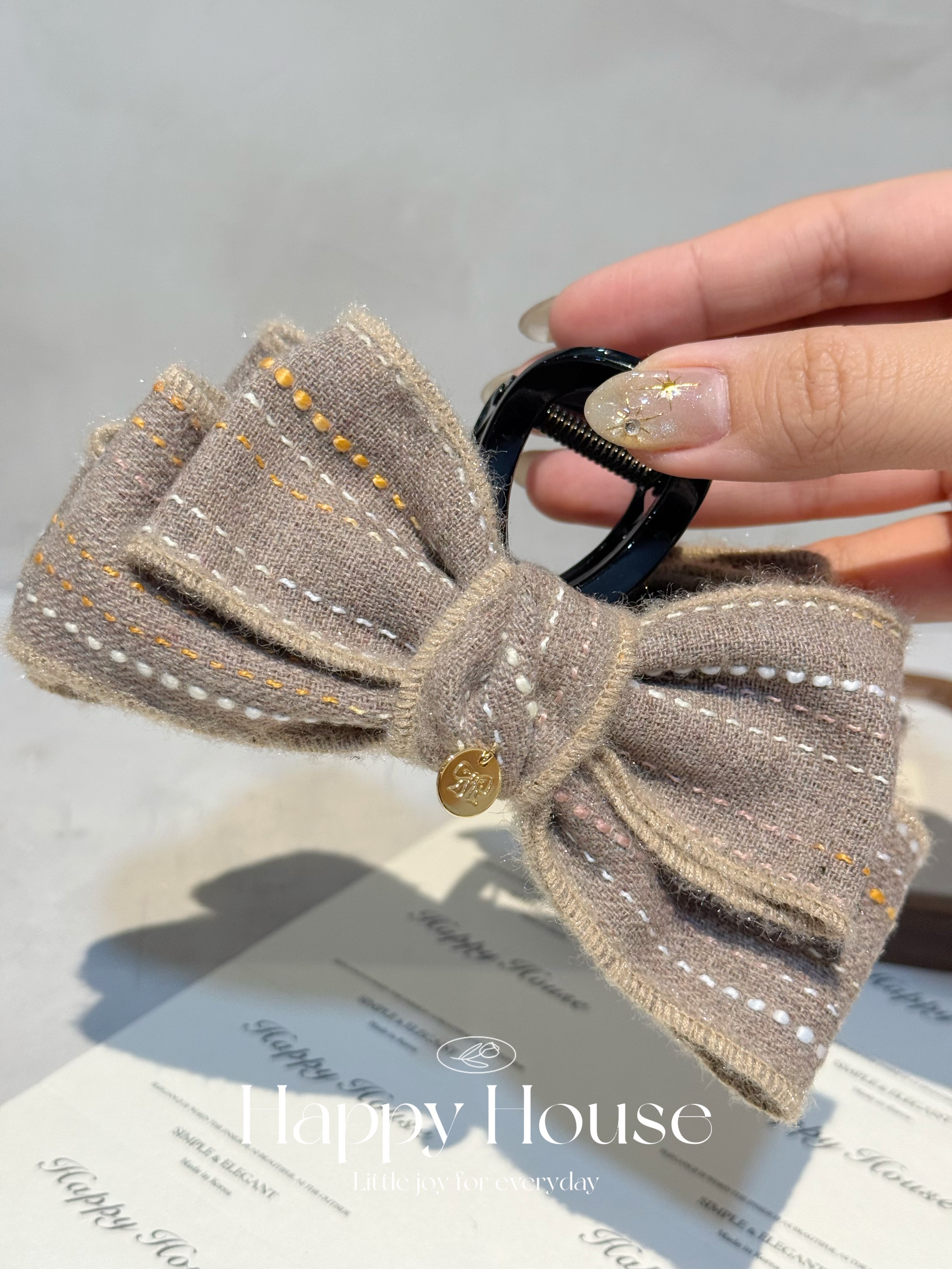 明線蝴蝶結抓夾