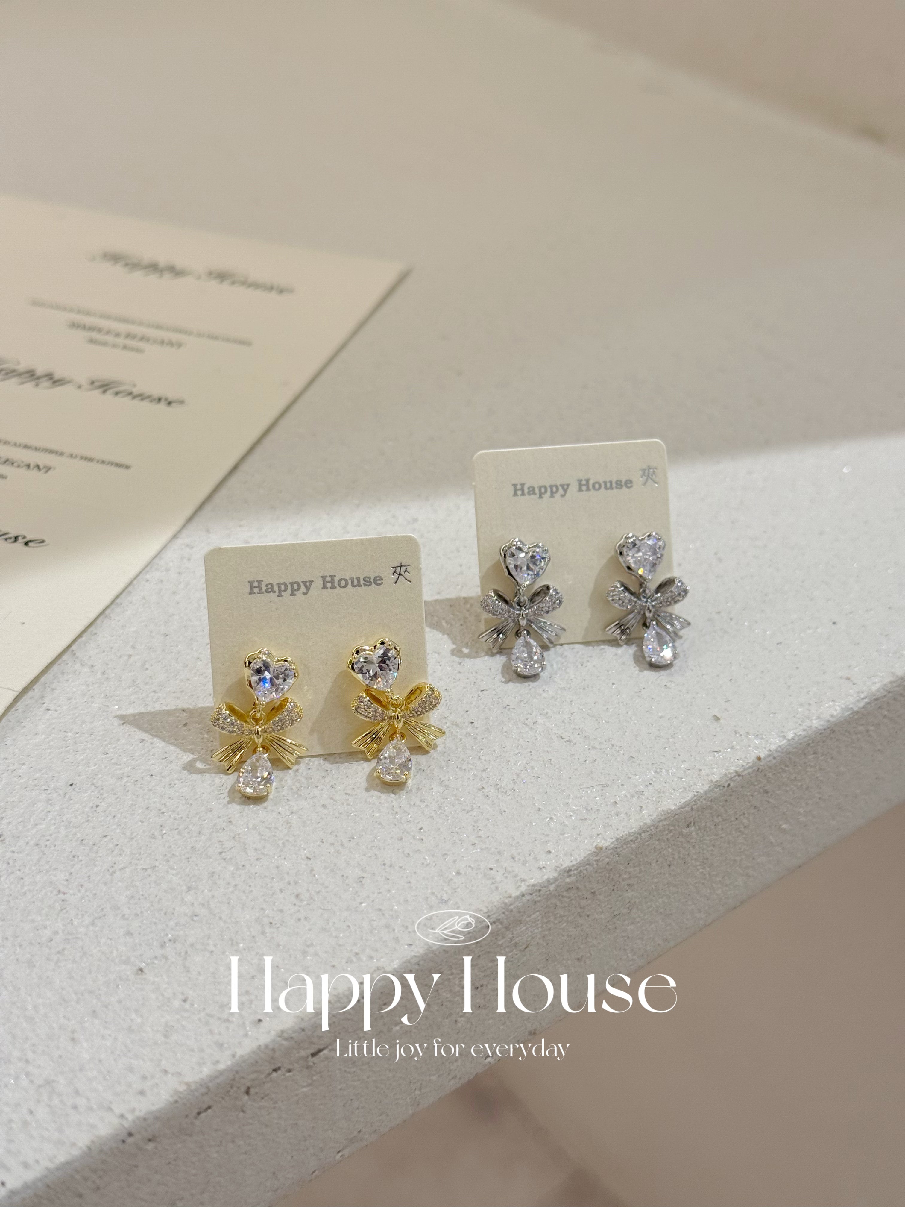 愛心蝴蝶結夾耳環