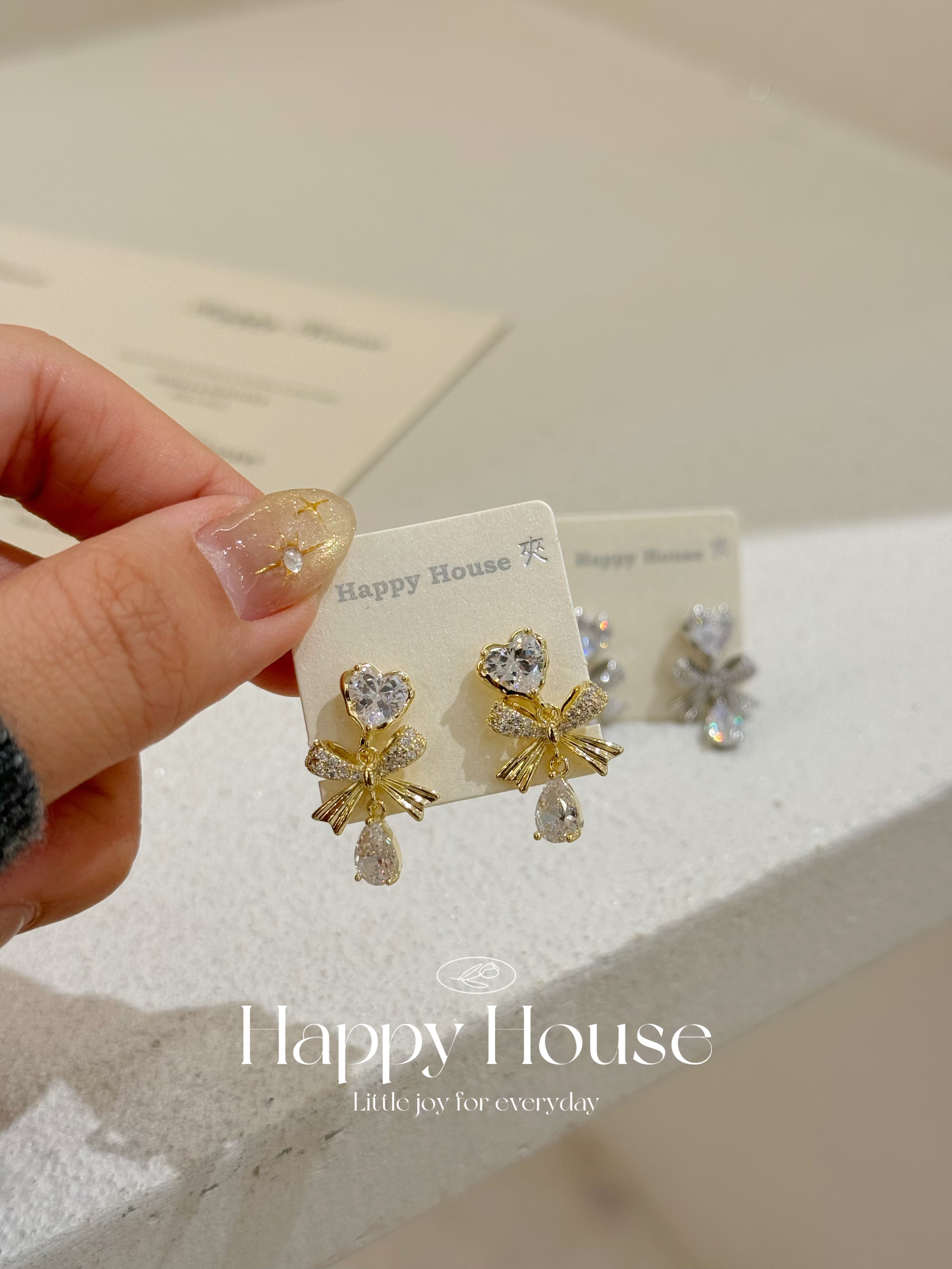 愛心蝴蝶結夾耳環