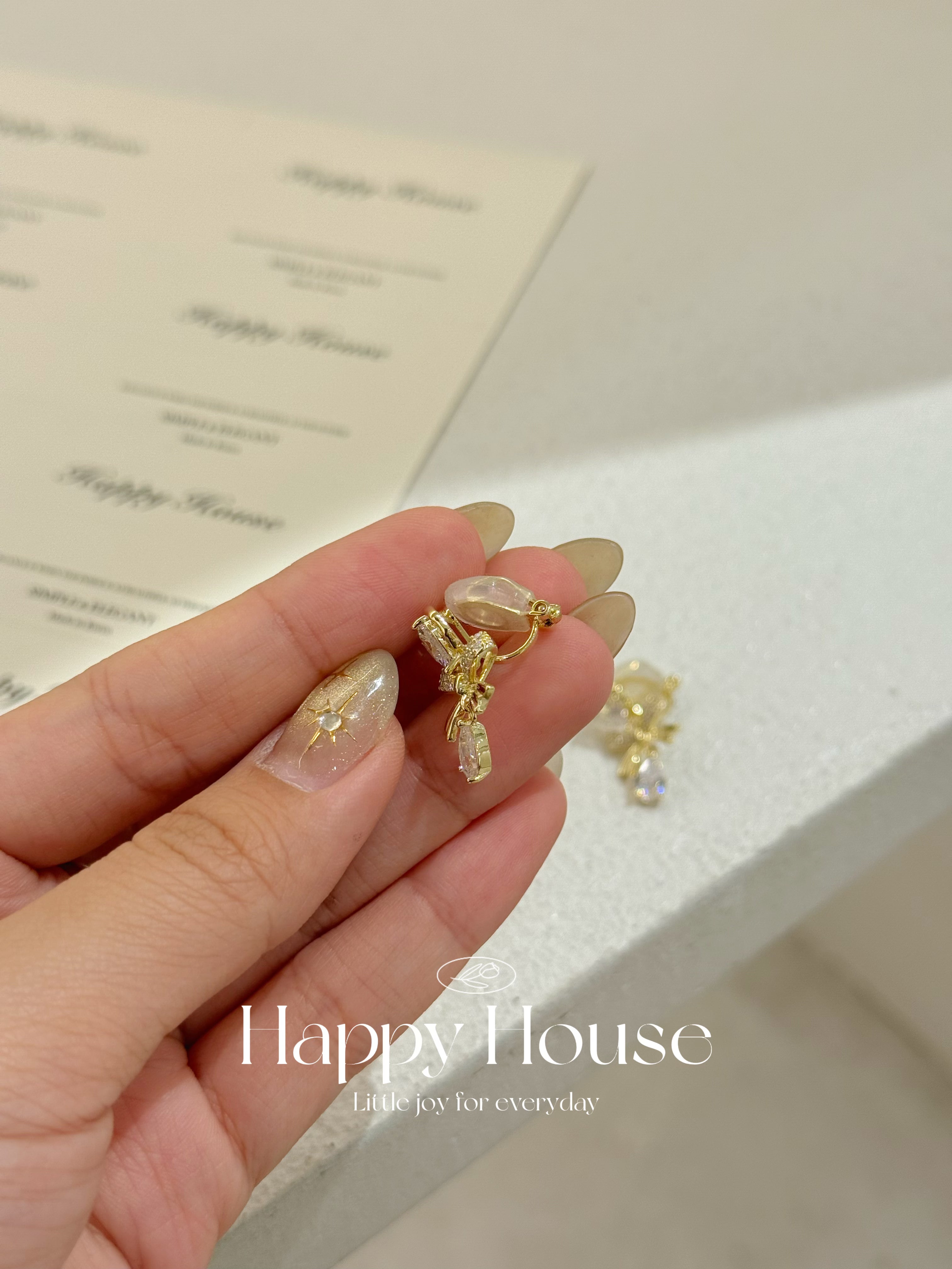 愛心蝴蝶結夾耳環